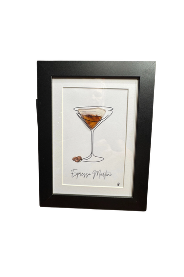 Framed artwork of an espresso martini with coffee beans.