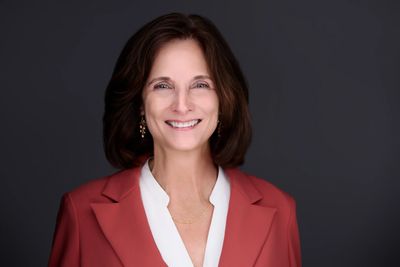 Kathy Serenko, AI speaker, presenting on AI risk and governance to a professional audience