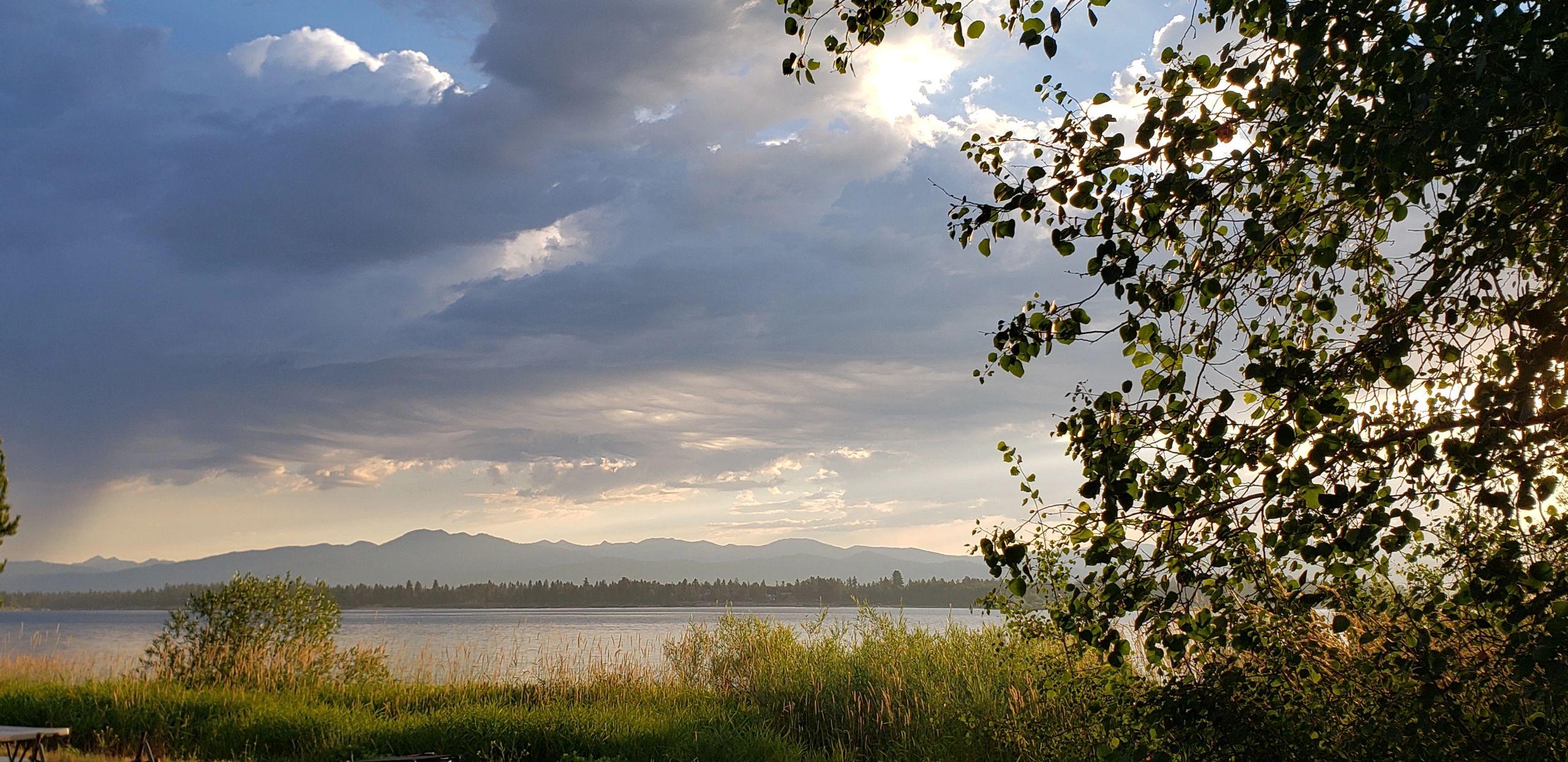 Mountain lake in fall, beautiful colors, morning sun