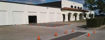 An image showing 6 to 8 inches of concrete replaced on a parking lot to repair damaged areas.