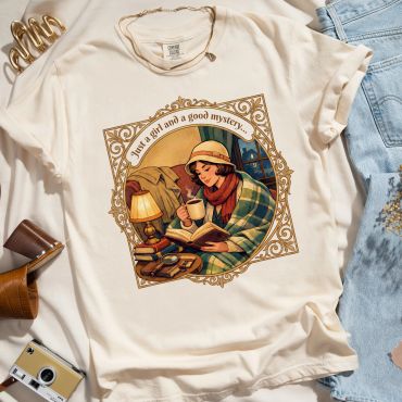 Graphic t-shirt with a girl illustration and vintage accessories.