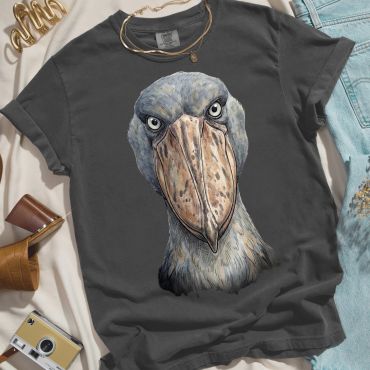 Dark t-shirt with a large bird face graphic.