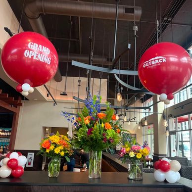 Red balloon centerpieces for Outback Steakhouse event in Birmingham AL