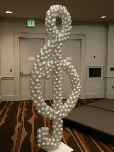 Musical note ballooon sculpture at corporate event in Birmingham AL