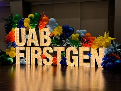Marquee Lighted Letters with Organic garland and starburst accents for UAB event in Birmingham AL