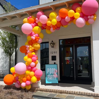 Organic balloon decor at entrance for summer pool party in Birmingham, AL
