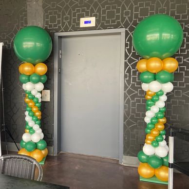 UAB balloon columns at school event for party decor.