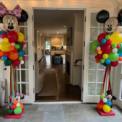 Mickey Mouse and Minnie Mouse themed balloon party poles for Birmingham AL birthday celebration.