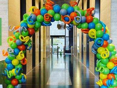 20' corporate balloon arch with curly q's in Birmingham AL