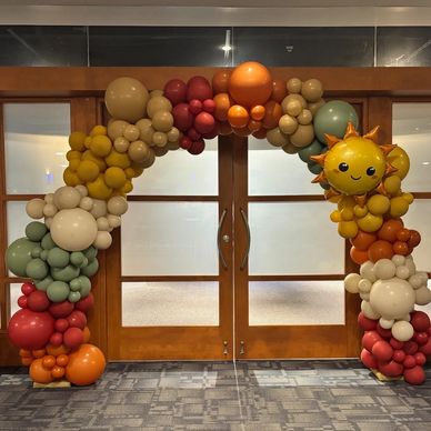 20' organic color blocked balloon arch at McWane center in Birmingham AL