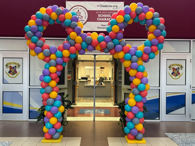Mickey Mouse themed balloon arch at school event in Hoover AL.