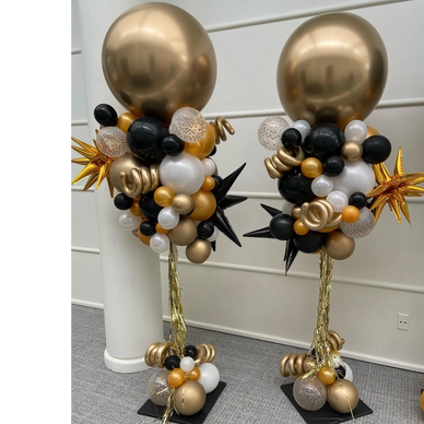 Elegant party poles in black and gold with starburst accents for private event in Birmingham Al.