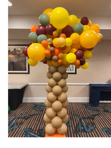 Fall colored tree balloon sculpture for corporate event in Birmingham AL