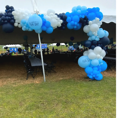 Balloon garland hung on tent at outdoor corporate event in Birmingham AL