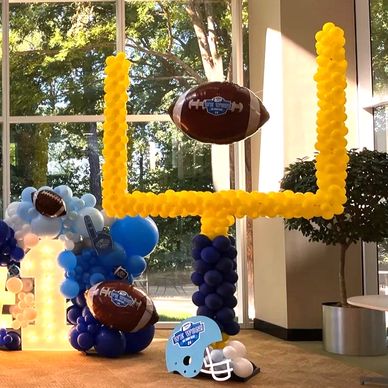 Goal post  balloon sculpture at football tailgating corporate event in Birmingham AL.