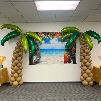 Palm tree balloon sculptures for corporate event in Birmingham AL.