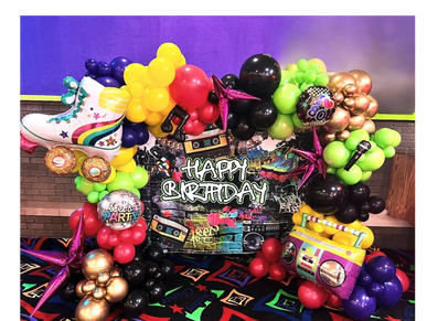 Premium Organic Balloon Garland attached to step and repeat banner at birthday party in Birmingham,