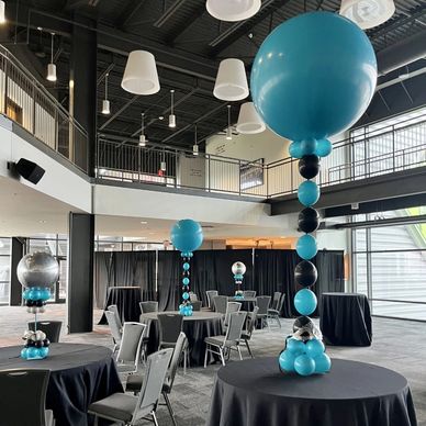 Turquoise and black centerpieces for private event in Birmingham AL.