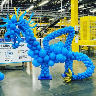 Custom balloon dragon shaped sculpture for corporate event in Birmingham AL.