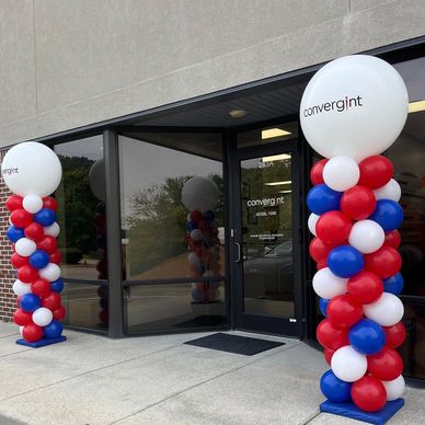 Balloon Columns with vinyl branding balloon accents celebrating grand opening in Birmingham AL.