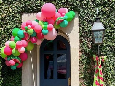 Spring colored balloon garland over doorway for private birthday party event in Birmingham AL