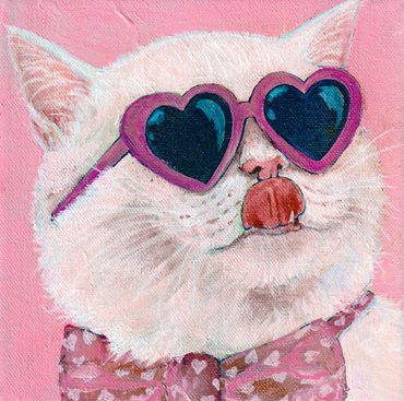 White cat wearing heart-shaped sunglasses and a bow tie on a pink background.
