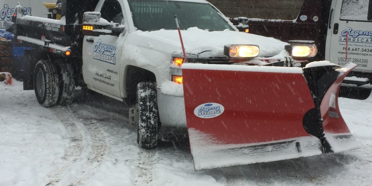 Snow Plowing and Salting Services by Regency Landscape, LLC