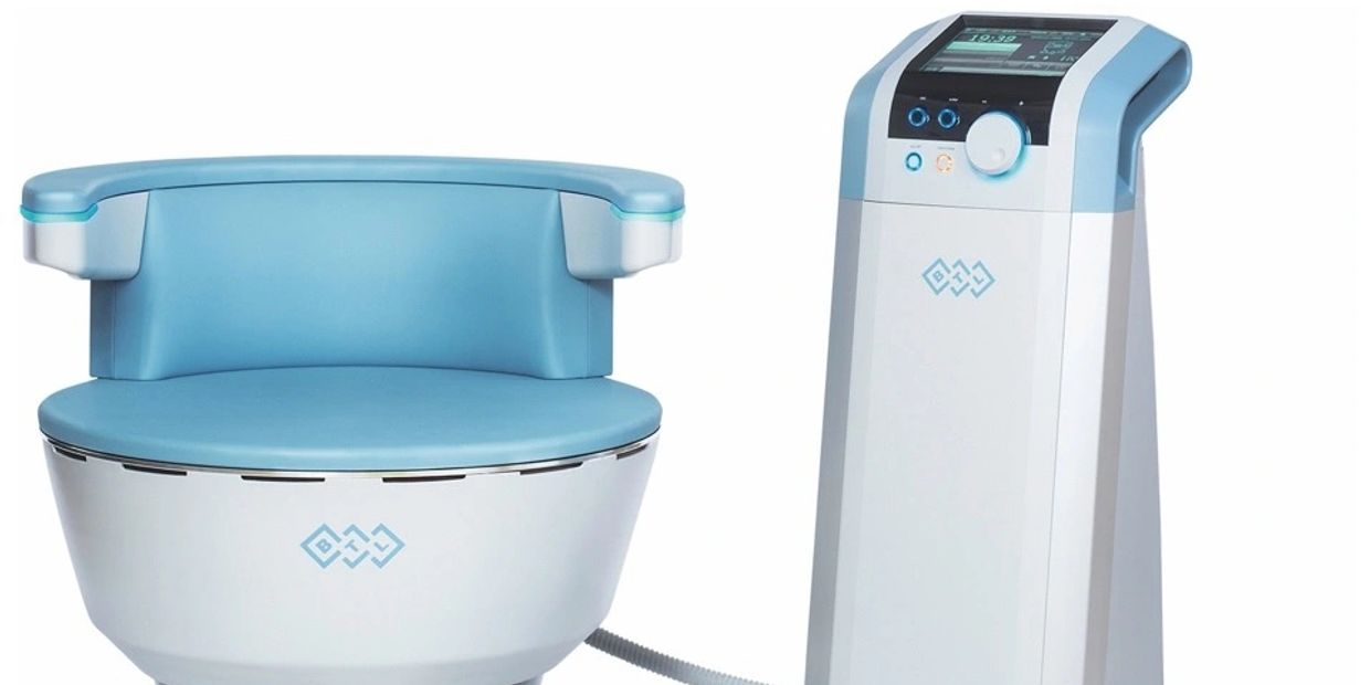 Medical device with a blue cushioned seat and control unit.