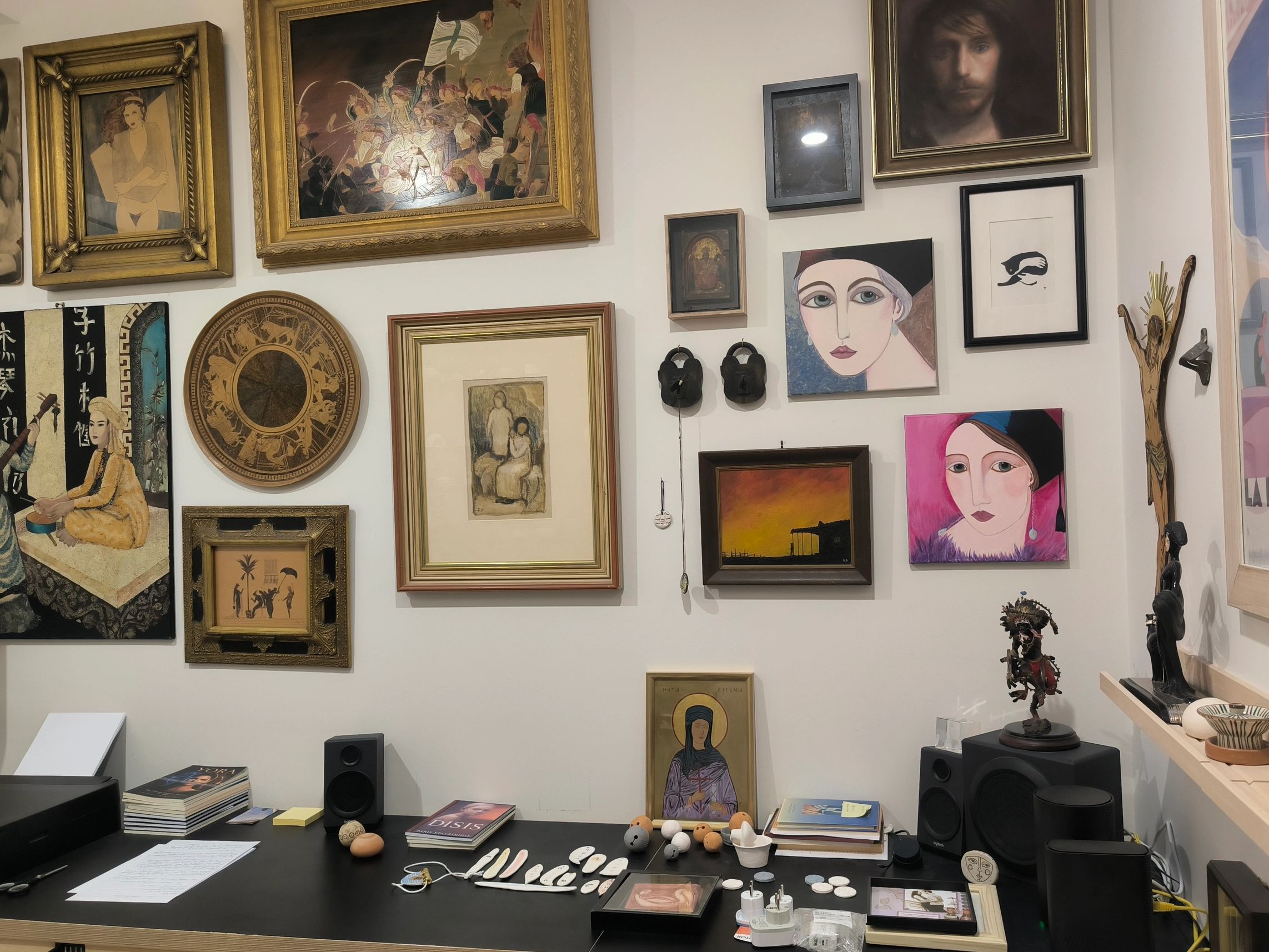 The art studio of Paris Stavrinidis, displaying paintings, pyrography, icons, ceramics and handmade