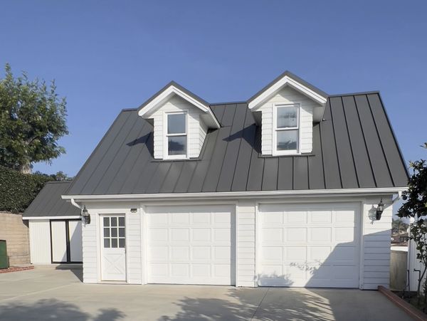 Garage with charcoal gray metal panels