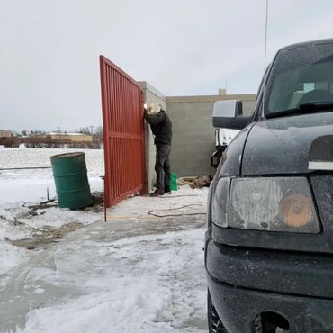 Lost Dog Acres dumpster gate repair