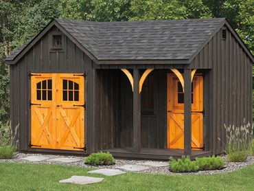 A black wooden shed with bright orange doors in a green garden.