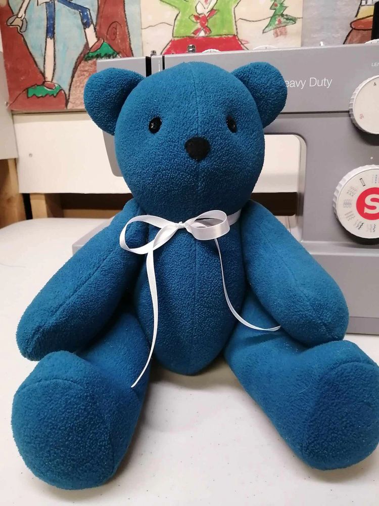 Blue Memory Bear with a White satin bow