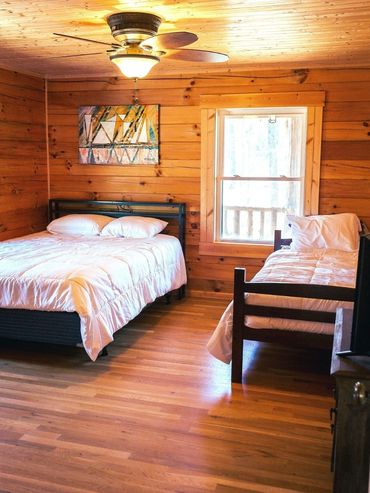Bedroom 1 with a Queen & a Twin bed