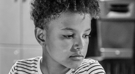 Actor sitting at the mixing desk