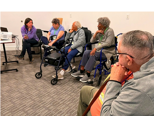 Group of seniors participating in memory care activities in Duluth at Peachtree Christian Health.
