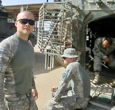 Photo of CEO Bruce Cardenas while on deployment in Iraq.