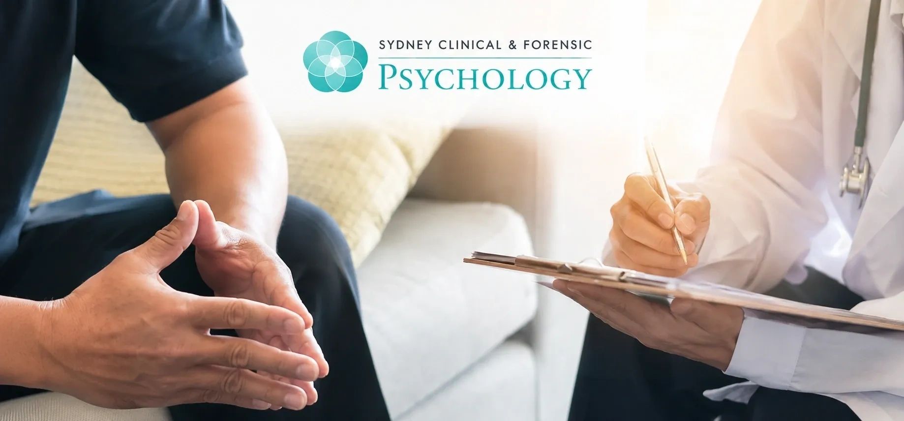 Psychologist consulting a patient during a therapy session at Sydney Clinical & Forensic Psychology.