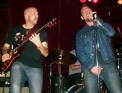 Chris Van Duyn & Johnny Rossa give "...strong vocal delivery and first rate guitar work..."