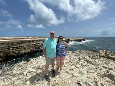 My husband and I at Devil's Bridge in Antigua