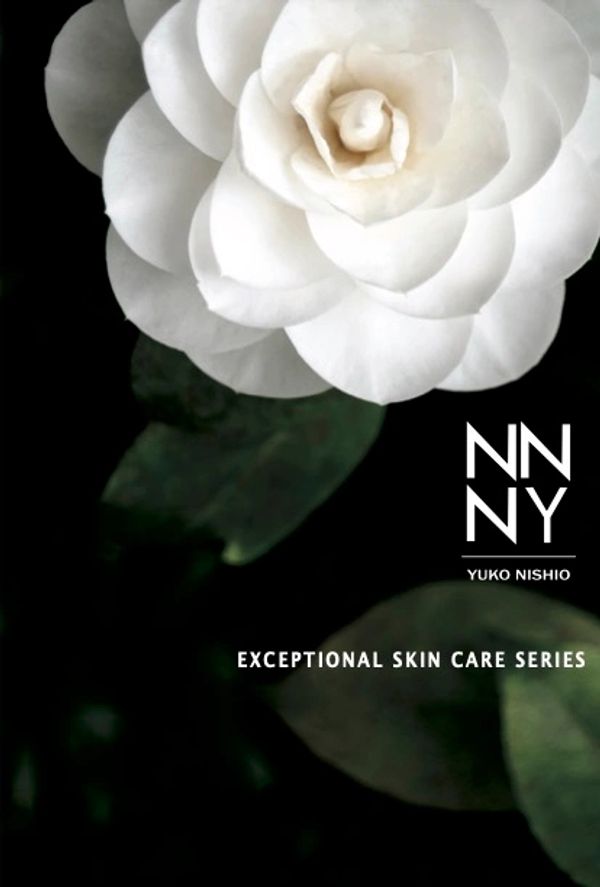 photo of white camelia on black for NNNY skincare