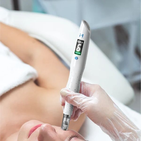 A hand holding a skincare device near a person's face during a treatment.