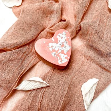 Blush pink cake heart with silver leaf decoration