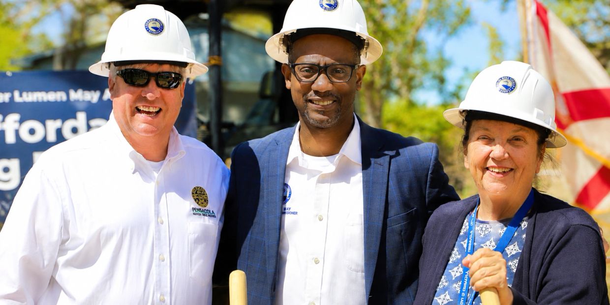 Ann Hill for Mayor with Grover Robinson and Commissioner Lumon May at affordable housing ground brea
