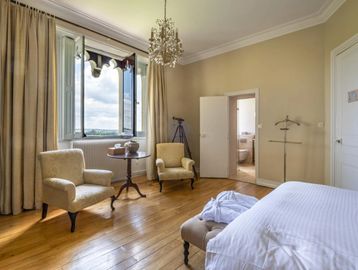 luxury bedroom with window open