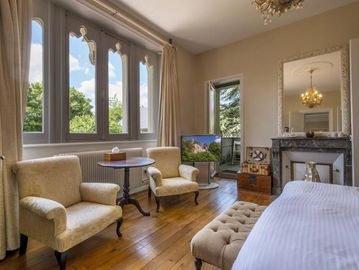luxury bedroom with outside balcony