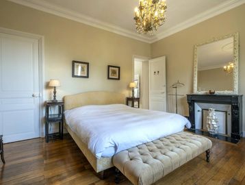 luxury bedroom with fireplace