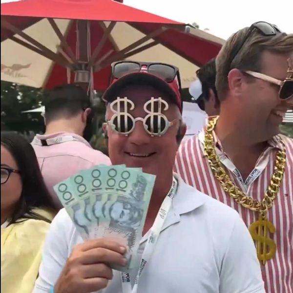 Man with photo props on the 360 video booth