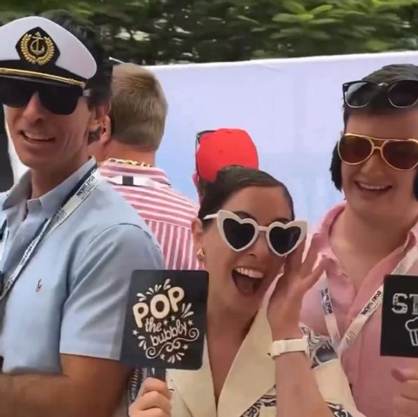 Man with photo props on the 360 video booth