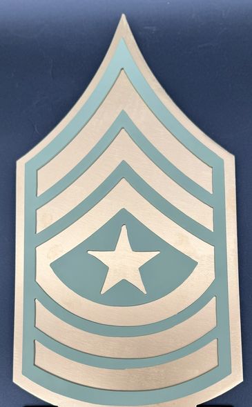 A wooden plaque featuring a U.S. Army rank insignia with a star and chevrons.